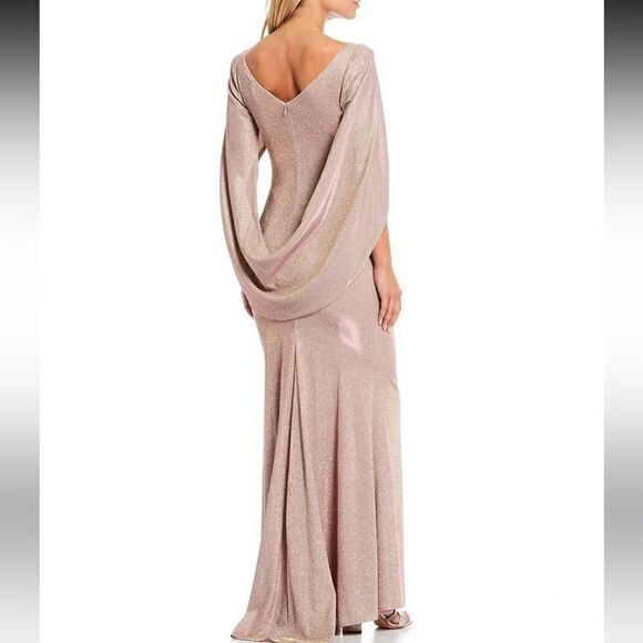 Betsy & Adam
Drape Back Boat Neck Galaxy Glitter 3/4 Sleeve Sheath Gown - Picture 2 of 9